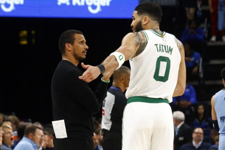Boston Celtics head coach Joe Mazzulla talks with Boston Celtics forward Jayson Tatum (0) during the fourth quarter against the Memphis Grizzlies at FedExForum.