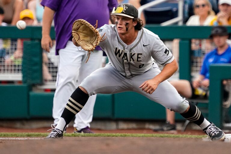 Wake Forest Demon Deacons first baseman Nick Kurtz (8) gets an out during the first inning against the LSU Tigers at Charles Schwab Field Omaha.
