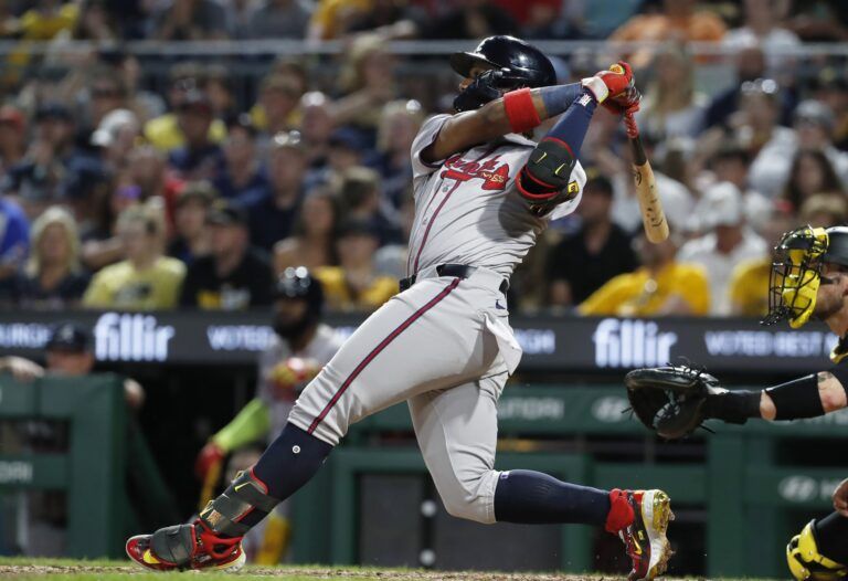 Atlanta Braves right fielder Ronald Acuna Jr. (13) hits a three-run home run against the Pittsburgh Pirates during the eighth inning at PNC Park.