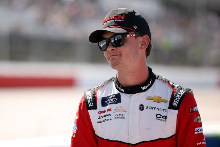 DARLINGTON, SOUTH CAROLINA - APRIL 05: Jesse Love, driver of the #2 Whelen Chevrolet, waits on the grid prior to the NASCAR Xfinity Series Sport Clips Haircuts VFW Help A Hero 200 at Darlington Raceway on April 05, 2025 in Darlington, South Carolina. (Photo by James Gilbert/Getty Images)