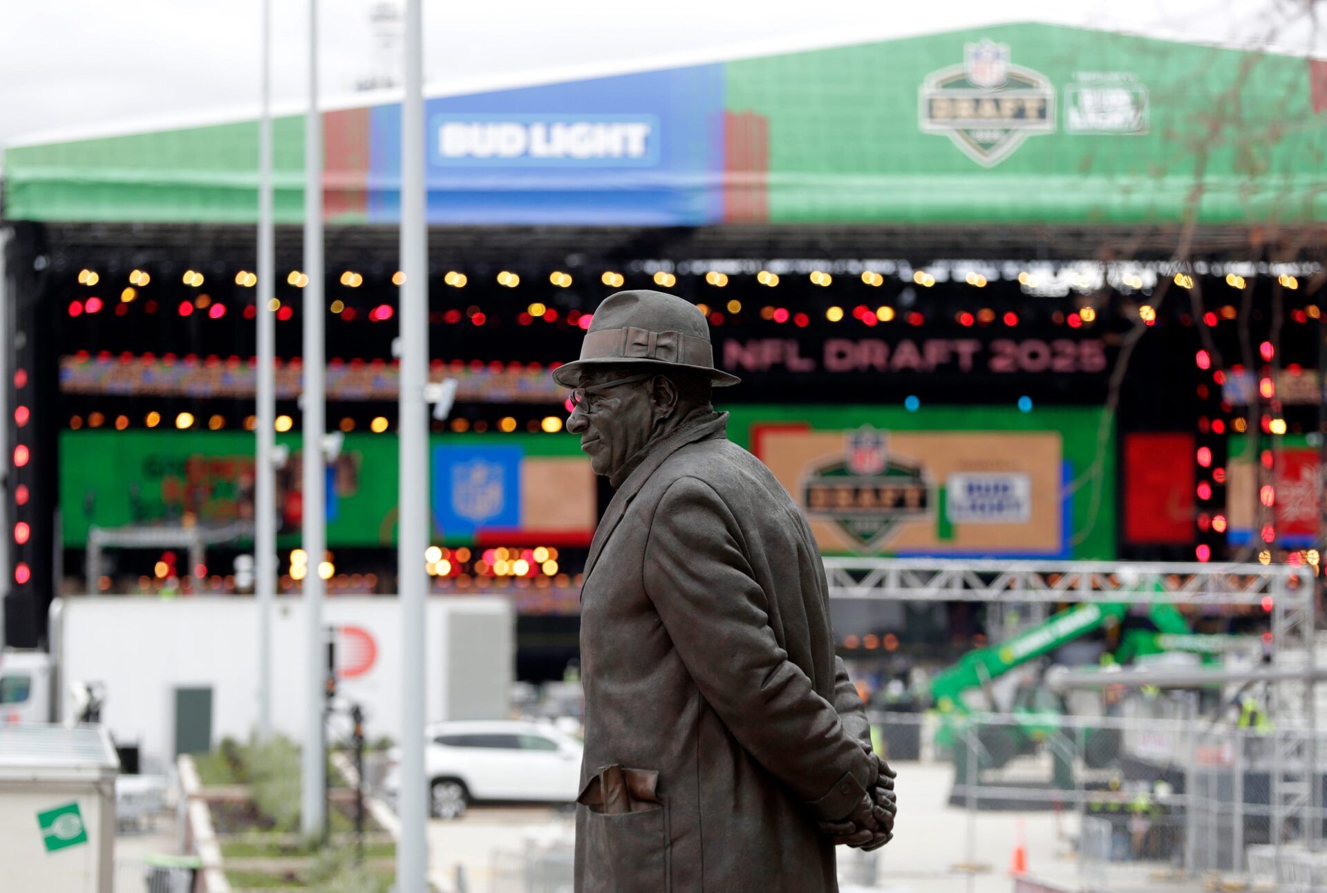 How can people not attending the 2025 NFL Draft in person at Lambeau Field catch the action in their homes between April 24-26?