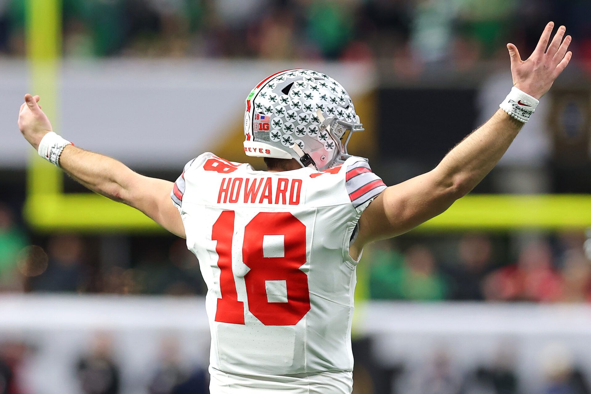 ATLANTA, GEORGIA - JANUARY 20: Will Howard #18 of the Ohio State Buckeyes reacts during the second quarter against the Notre Dame Fighting Irish in the 2025 CFP National Championship at the Mercedes-Benz Stadium on January 20, 2025 in Atlanta, Georgia. (Photo by Kevin C. Cox/Getty Images)