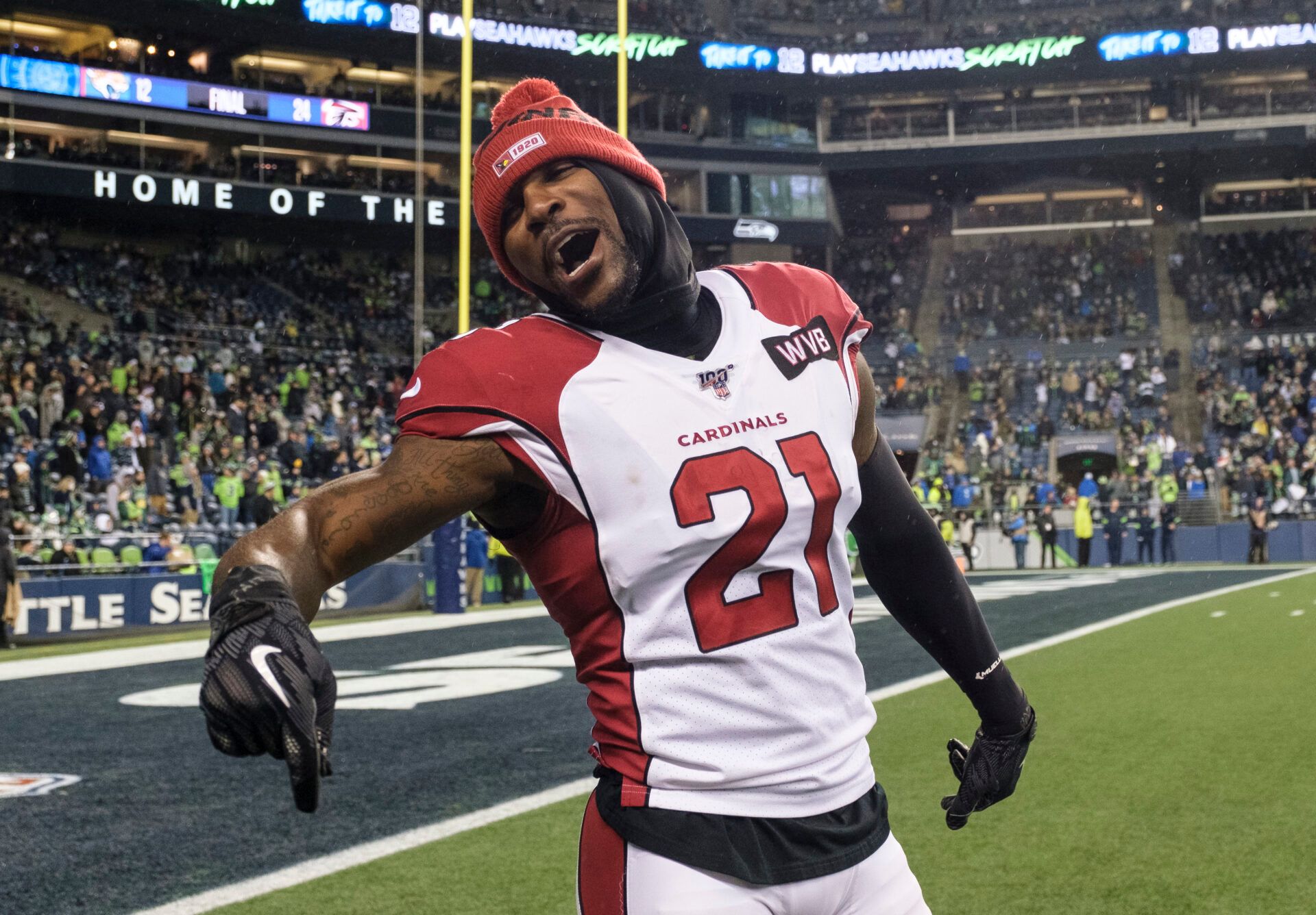 SEATTLE, WA - DECEMBER 22: Defensive back Patrick Peterson #21 of the Arizona Cardinals celebrates on the sideline during the second half of game against the Seattle Seahawks at CenturyLink Field on December 22, 2019 in Seattle, Washington. The Cardinals won 27-13. (Photo by Stephen Brashear/Getty Images)
