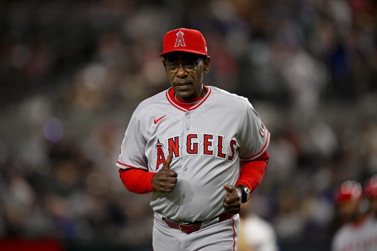 Los Angeles Angels manager Ron Washington trots back to the dugout during the eighth inning against the Texas Rangers at Globe Life Field. All MLB players will be wearing the number 42 on Jackie Robinson Day to commemorate Robinson making his major league debut in 1947.