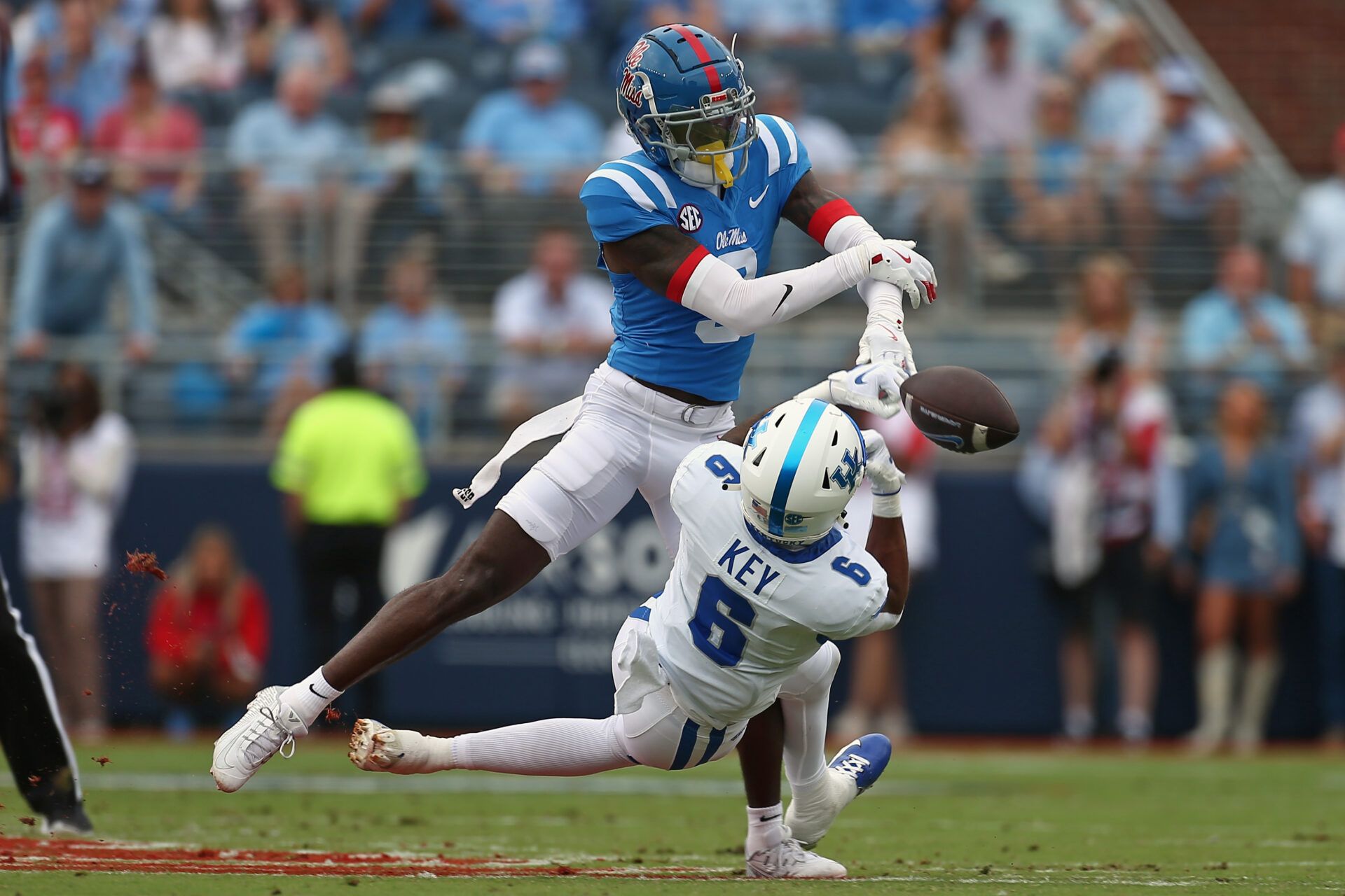 Sep 28, 2024; Oxford, Mississippi, USA; Mississippi Rebels defensive back Trey Amos (9) breaks up a pass intended for Kentucky Wildcats wide receiver Dane Key (6) during the first half at Vaught-Hemingway Stadium. Mandatory Credit: Petre Thomas-Imagn Images