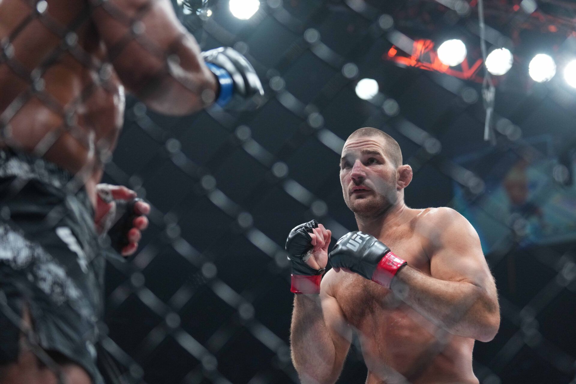 Jun 1, 2024; Newark, New Jersey, USA; Sean Strickland (red gloves) fights Paulo Costa (blue gloves) during UFC 302 at Prudential Center. Mandatory Credit: Joe Camporeale-USA TODAY Sports