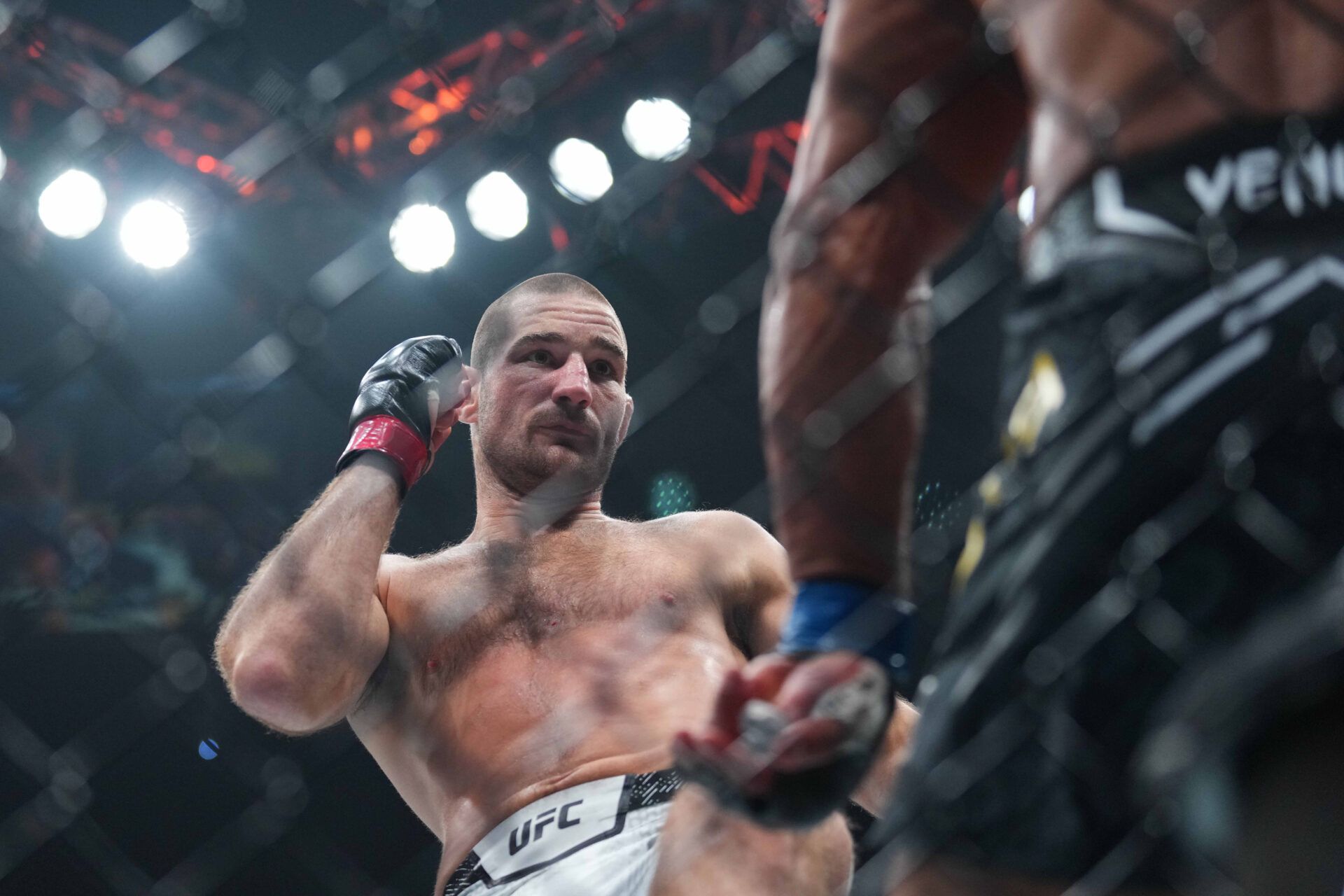 Jun 1, 2024; Newark, New Jersey, USA; Sean Strickland (red gloves) fights Paulo Costa (blue gloves) during UFC 302 at Prudential Center. Mandatory Credit: Joe Camporeale-USA TODAY Sports