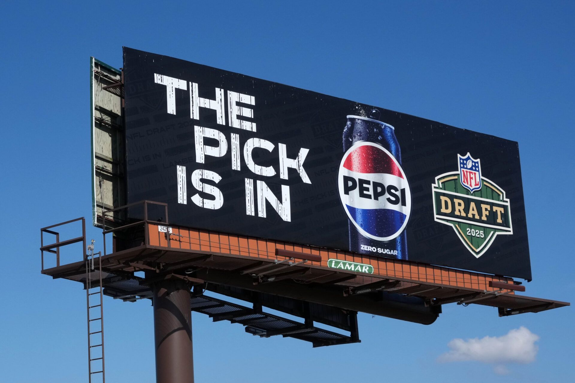 Apr 23, 2025; Green Bay, WI, USA; A Pepsi advertisement promoting the 2025 NFL Draft. Mandatory Credit: Kirby Lee-Imagn Images