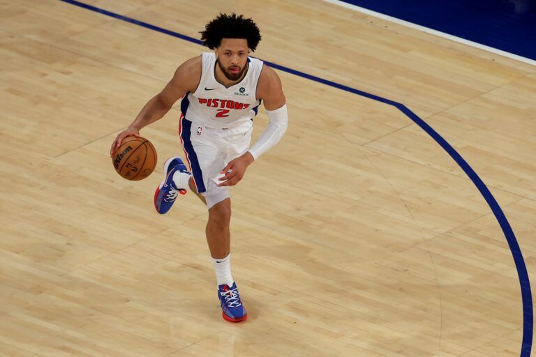 Detroit Pistons guard Cade Cunningham (2) brings the ball up court against the New York Knicks during the first quarter of game two of first round of the 2024 NBA Playoffs at Madison Square Garden.