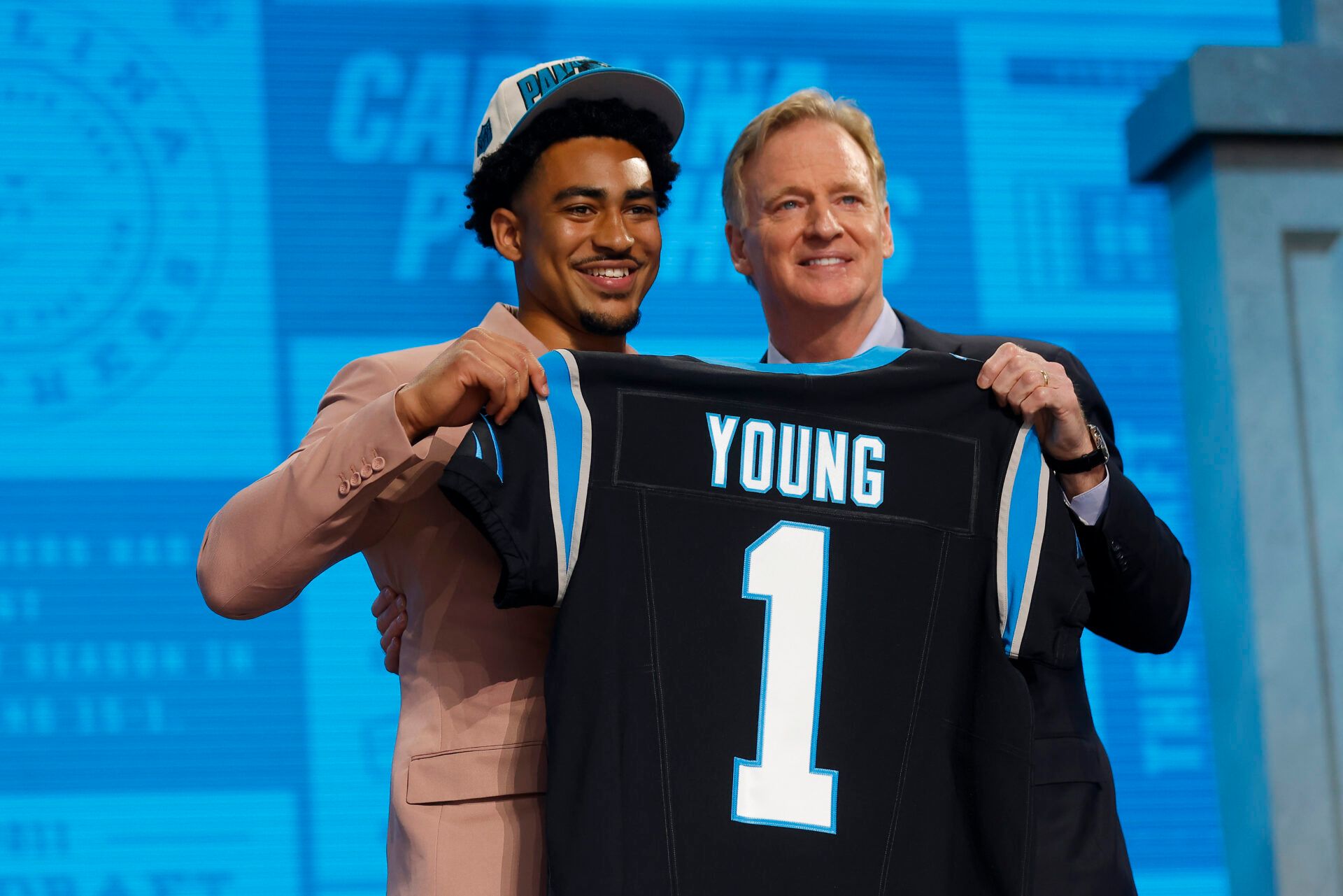 KANSAS CITY, MISSOURI - APRIL 27: (L-R) Bryce Young poses with NFL Commissioner Roger Goodell after being selected first overall by the Carolina Panthers during the first round of the 2023 NFL Draft at Union Station on April 27, 2023 in Kansas City, Missouri. (Photo by David Eulitt/Getty Images)