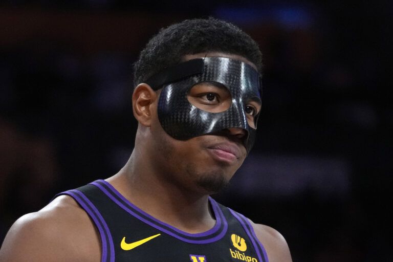Dec 18, 2023; Los Angeles, California, USA; Los Angeles Lakers forward Rui Hachimura (28) wears a face mask against the New York Knicks in the first half at Crypto.com Arena. Mandatory Credit: Kirby Lee-USA TODAY Sports