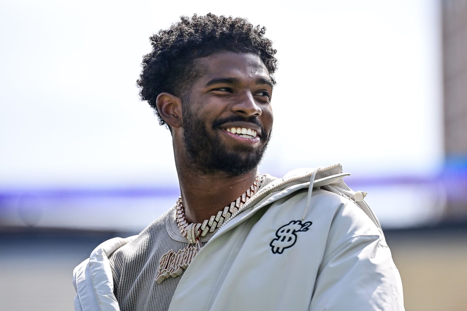 BOULDER, CO - APRIL 19: Former Colorado Buffaloes quarterback Shedeur Sanders looks on during a ceremony to retire his jersey before the Black and Gold Spring Game at Folsom Field on April 19, 2025 in Boulder, Colorado. (Photo by Dustin Bradford/Getty Images for ONIT)