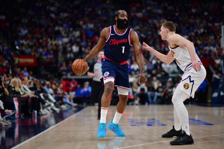 Apr 24, 2025; Inglewood, California, USA; Los Angeles Clippers guard James Harden (1) controls the ball against Denver Nuggets guard Christian Braun (0) during the second half of game three in the first round for the 2024 NBA Playoffs at Intuit Dome. Mandatory Credit: Gary A. Vasquez-Imagn Images