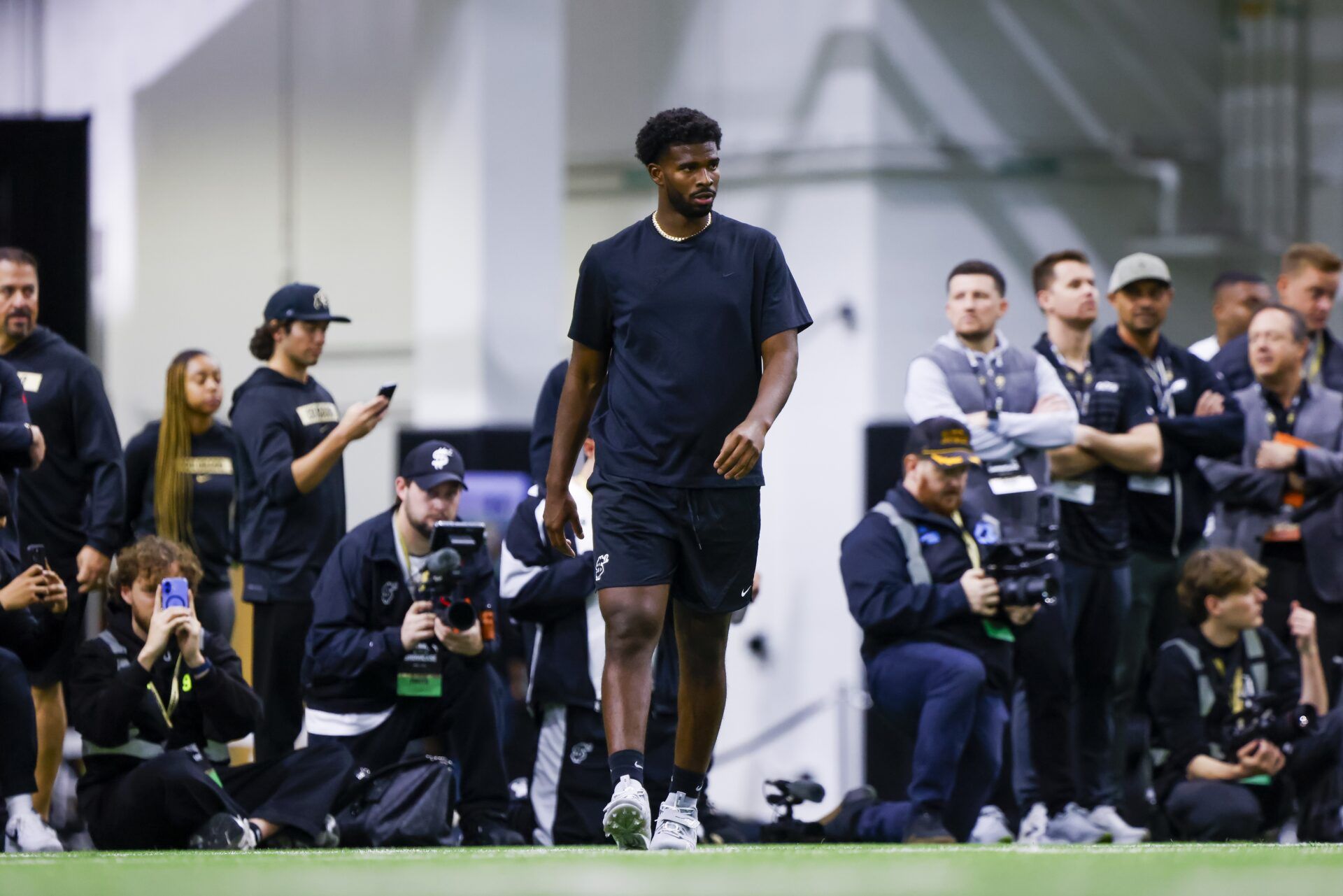 Colorado Buffaloes quarterback Shedeur Sanders (2) runs drills at the University of Colorado NFL Showcase at the CU Indoor Practice Facility.