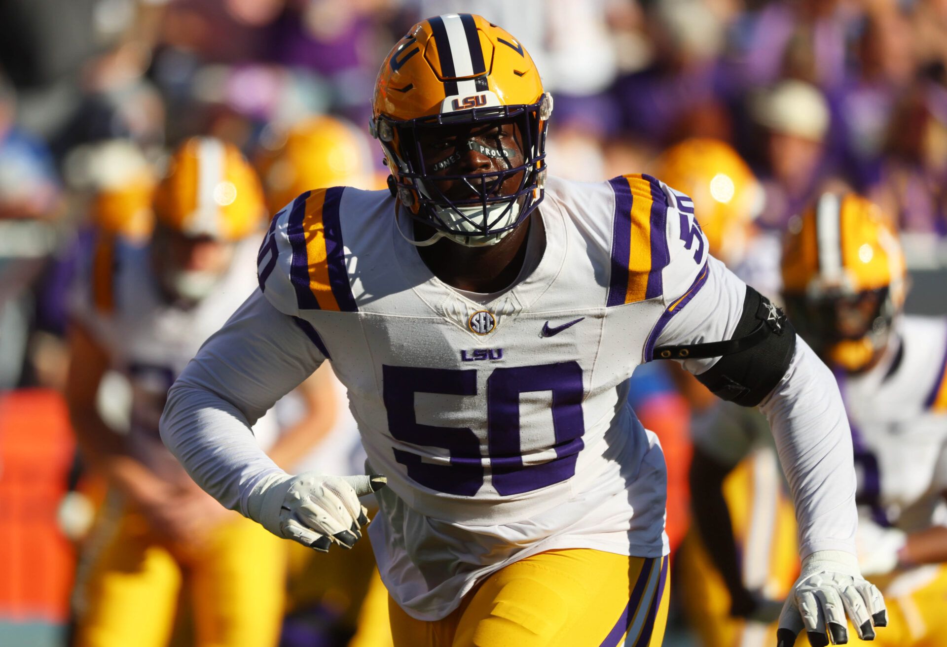Nov 16, 2024; Gainesville, Florida, USA; LSU Tigers offensive lineman Emery Jones Jr. (50) warms up prior to the game against the Florida Gators at Ben Hill Griffin Stadium. Mandatory Credit: Kim Klement Neitzel-Imagn Images