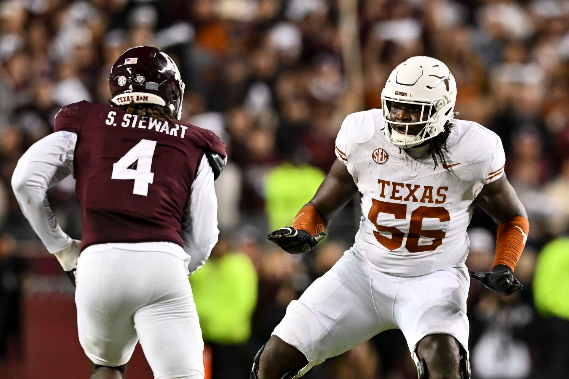 Nov 30, 2024; College Station, Texas, USA; Texas Longhorns offensive lineman Cameron Williams (56) blocks during the first half against the Texas A&M Aggies. The Longhorns defeated the Aggies 17-7 at Kyle Field. Mandatory Credit: Maria Lysaker-Imagn Images
