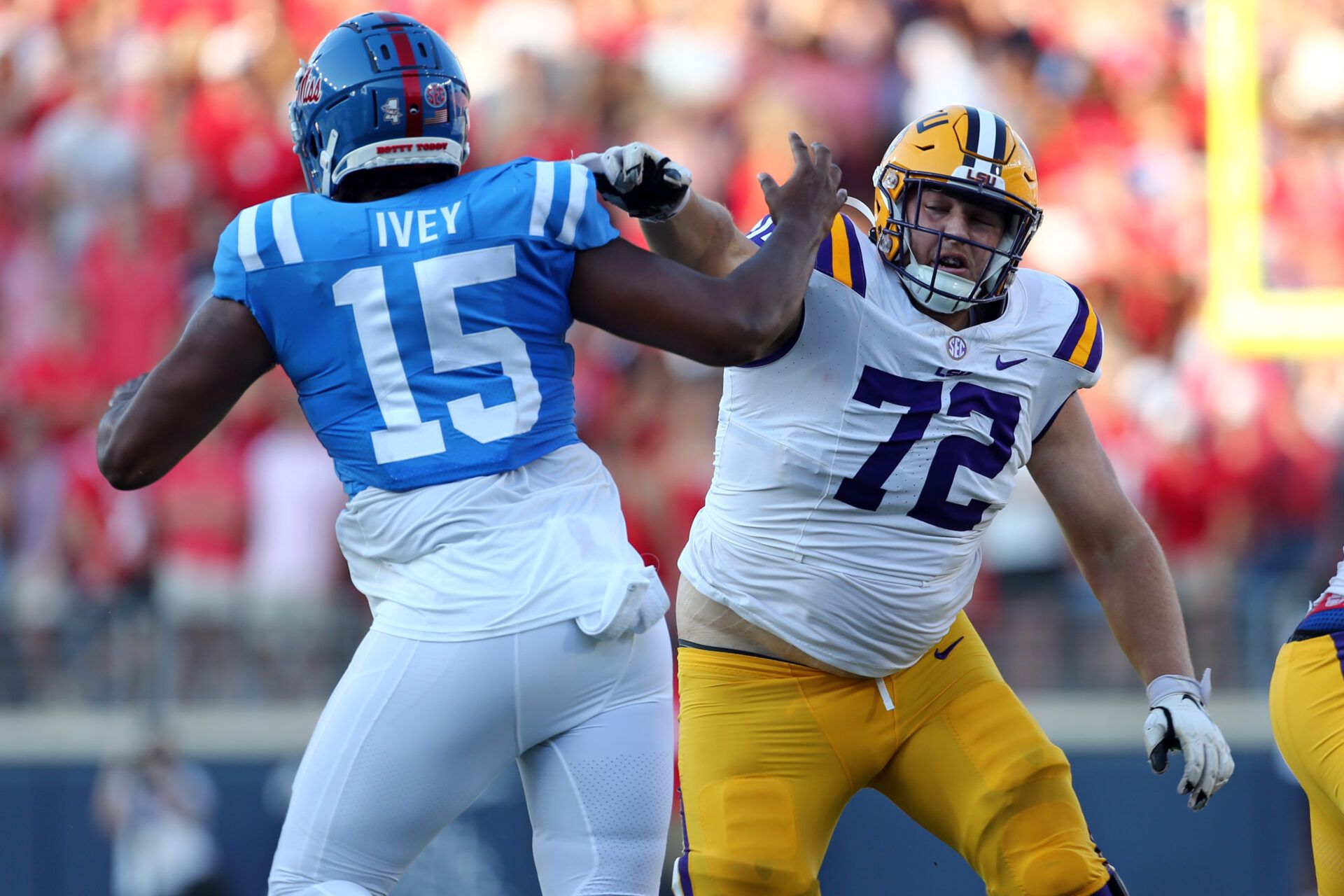 Sep 30, 2023; Oxford, Mississippi, USA; LSU Tigers offensive linemen Garrett Dellinger (72) blocks Mississippi Rebels defensive linemen Jared Ivey (15) during the first half at Vaught-Hemingway Stadium. Mandatory Credit: Petre Thomas-USA TODAY Sports
