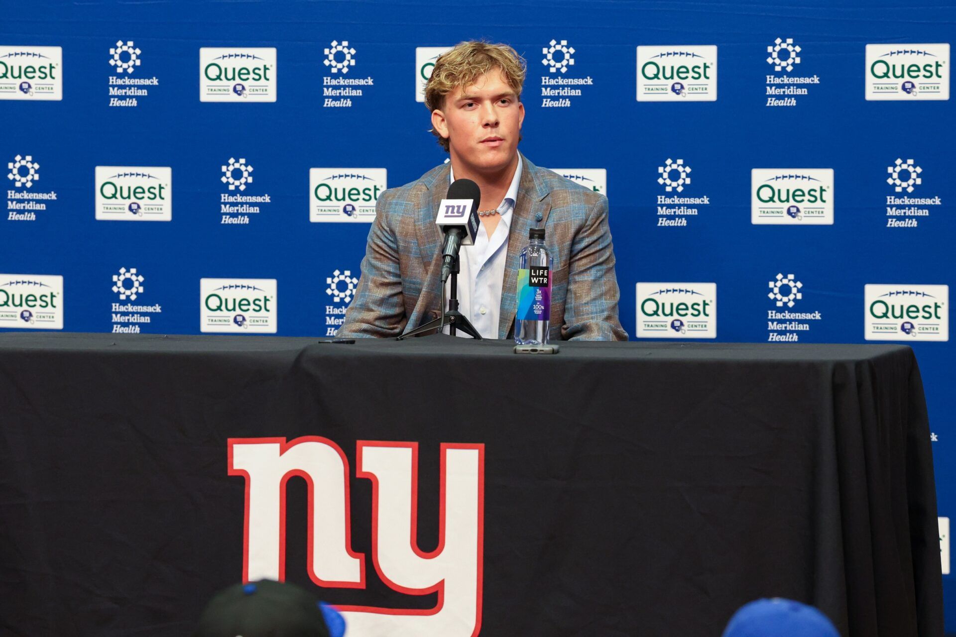 New York Giants first round draft pick, Jaxson Dart, takes questions from the media during his introduction press conference. New York Giants