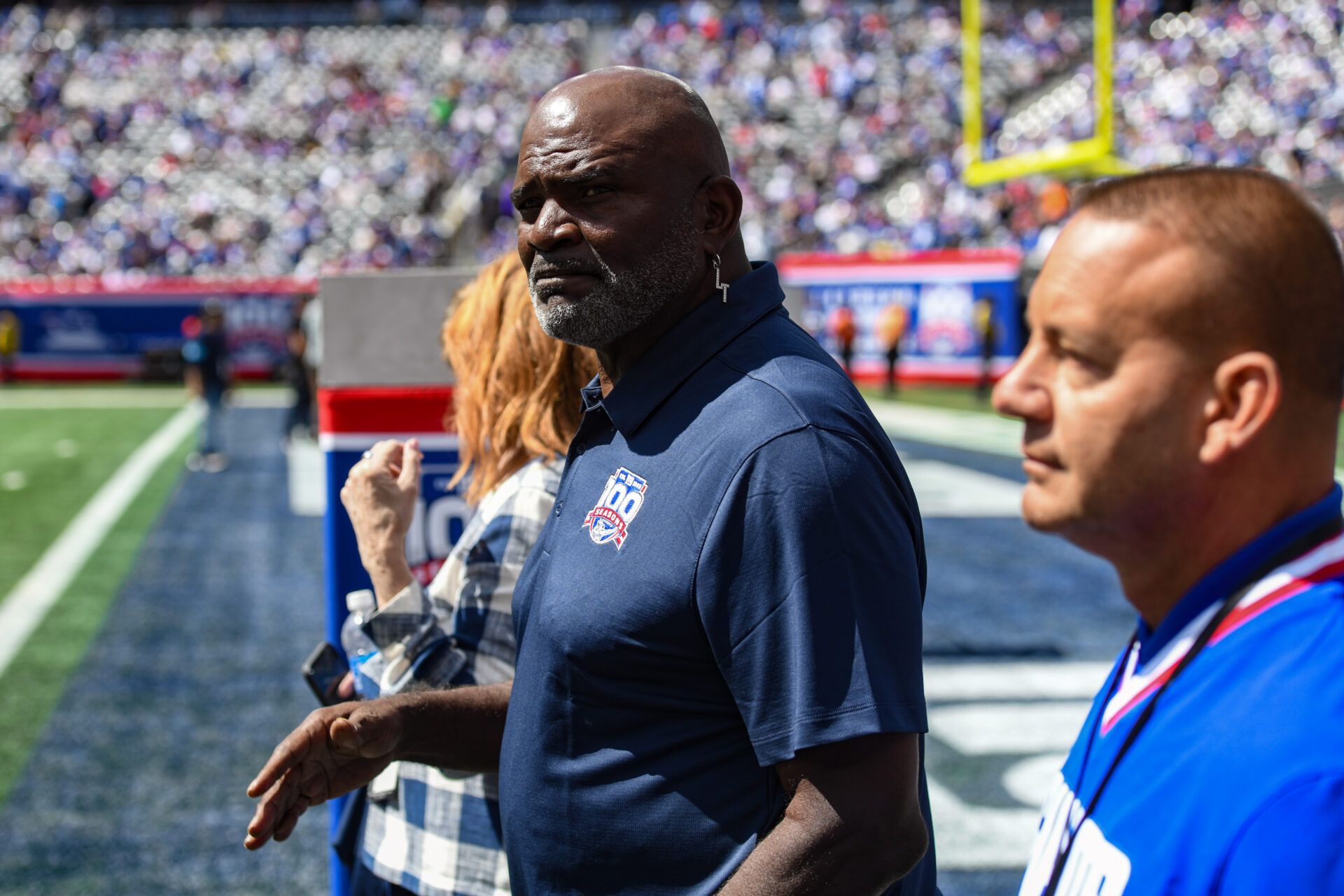 Sep 8, 2024; East Rutherford, New Jersey, USA; New York Giants legend Lawrence Taylor enters the field before a game between the New York Giants and the Minnesota Vikings at MetLife Stadium. Mandatory Credit: John Jones-Imagn Images