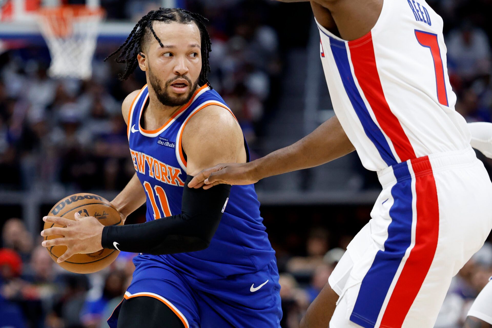 Apr 24, 2025; Detroit, Michigan, USA; New York Knicks guard Jalen Brunson (11) is defended by Detroit Pistons forward Paul Reed (7) in the first half during game three of first round for the 2024 NBA Playoffs at Little Caesars Arena. Mandatory Credit: Rick Osentoski-Imagn Images
