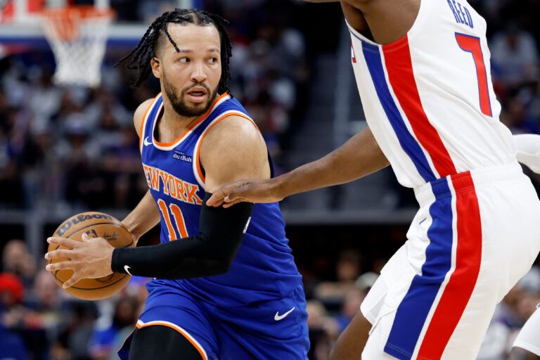 Apr 24, 2025; Detroit, Michigan, USA; New York Knicks guard Jalen Brunson (11) is defended by Detroit Pistons forward Paul Reed (7) in the first half during game three of first round for the 2024 NBA Playoffs at Little Caesars Arena. Mandatory Credit: Rick Osentoski-Imagn Images