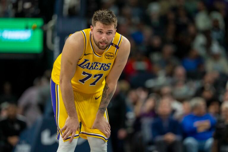 Apr 25, 2025; Minneapolis, Minnesota, USA; Los Angeles Lakers guard Luka Doncic (77) looks on against the Minnesota Timberwolves in the first half during game three of first round for the 2024 NBA Playoffs at Target Center. Mandatory Credit: Jesse Johnson-Imagn Images