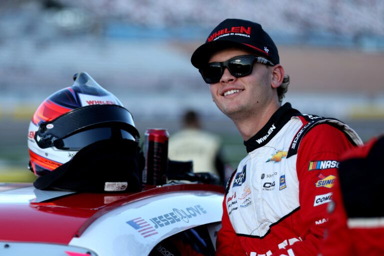 LAS VEGAS, NEVADA - OCTOBER 19: Jesse Love, driver of the #2 Whelen Chevrolet, enters his car for the NASCAR Xfinity Series Ambetter Health 302 at Las Vegas Motor Speedway on October 19, 2024 in Las Vegas, Nevada. (Photo by Meg Oliphant/Getty Images)