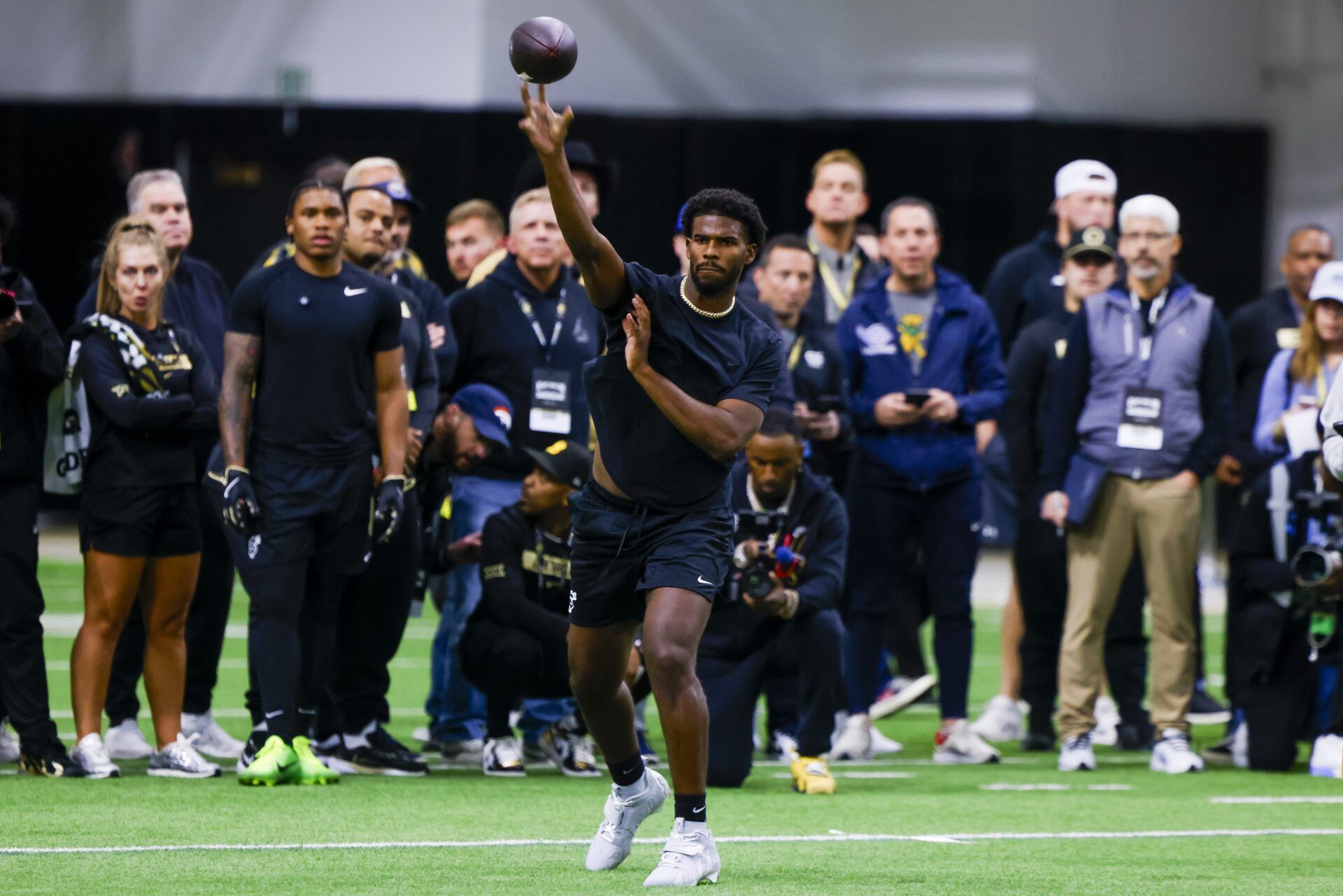 Apr 4, 2025; Boulder, CO, USA; Colorado Buffaloes quarterback Shedeur Sanders (2) passes the ball at the University of Colorado NFL Showcase at the CU Indoor Practice Facility. Mandatory Credit: Michael Ciaglo-Imagn Images