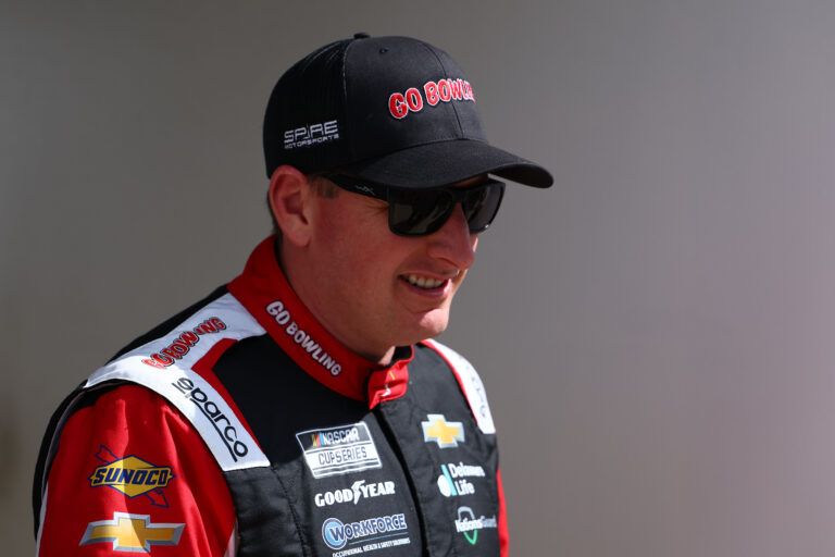 Feb 16, 2025; Daytona Beach, Florida, USA; NASCAR Cup Series driver Michael McDowell (71) walks to the drivers meeting before the Daytona 500 at Daytona International Speedway. Mandatory Credit: Peter Casey-Imagn Images