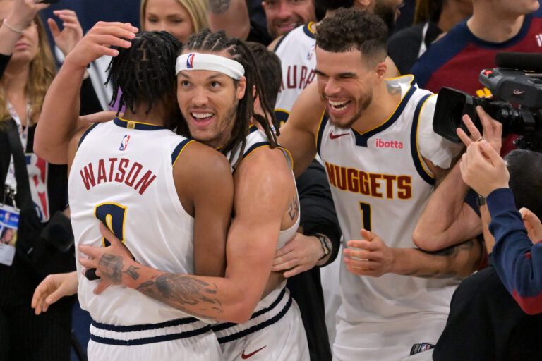 Apr 26, 2025; Inglewood, California, USA; Denver Nuggets forward Aaron Gordon (32) is congratulated by forward Peyton Watson (8) and forward Michael Porter Jr. (1) after the game winning dunk to defeat the Los Angeles Clippers 101-99 in game four of round one of the 2024 NBA Playoffs at Intuit Dome. Mandatory Credit: Jayne Kamin-Oncea-Imagn Images