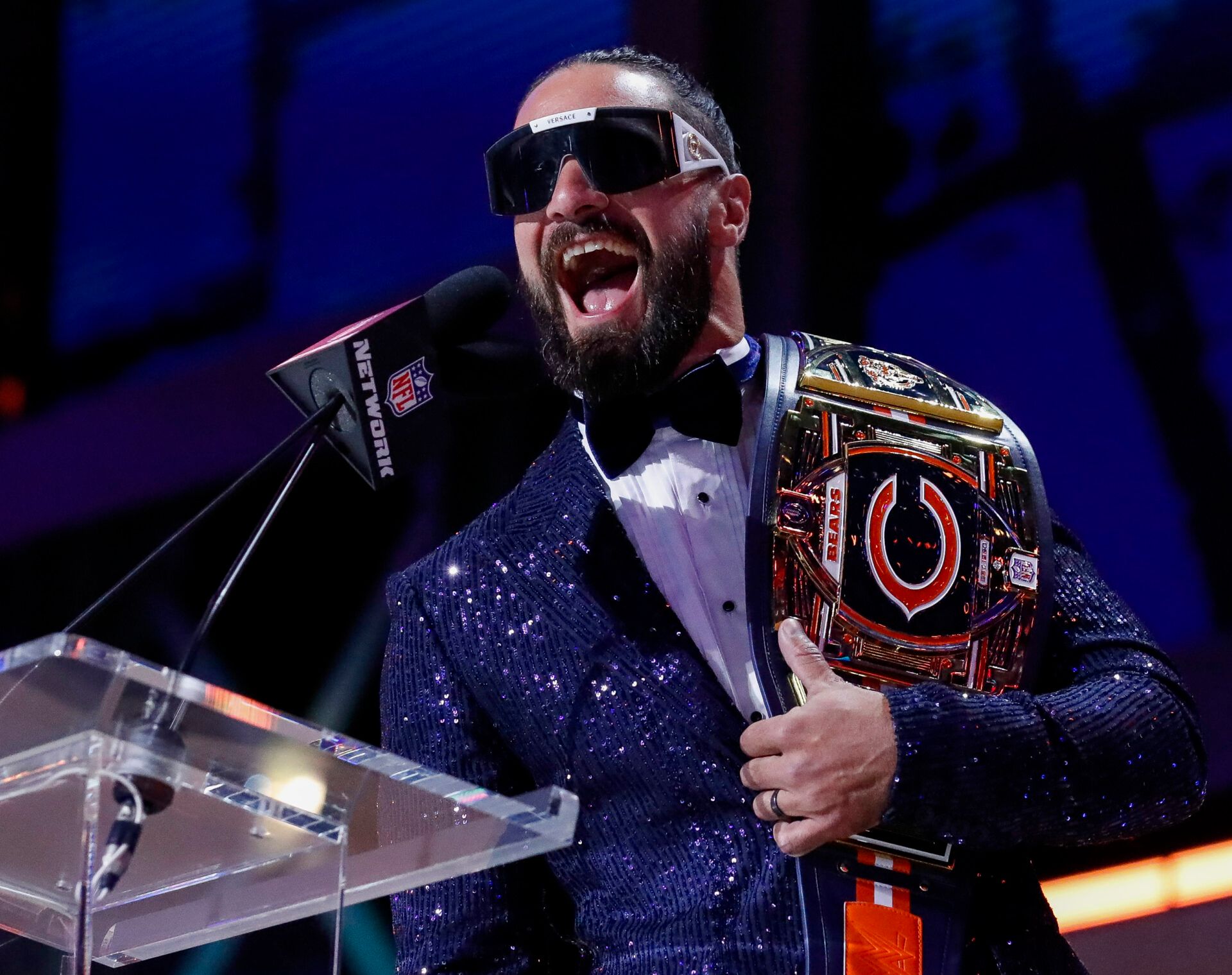 Apr 25, 2025; Green Bay, WI, USA; FWWE wrestler and Chicago Bears fan Seth Rollins taunts the crowd before announcing the team’s selection with the 56th overall pick during the second round of the 2025 NFL Draft at Lambeau Field. Mandatory Credit: Tork Mason/USA Today Network via Imagn Images