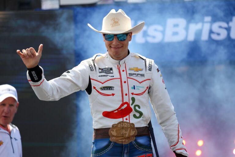 Apr 13, 2025; Bristol, Tennessee, USA; NASCAR Cup Series driver Carson Hocevar (77) during driver introductions for the NASCAR Food City 500 at Bristol Motor Speedway. Mandatory Credit: Randy Sartin-Imagn Images
