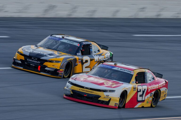 Apr 26, 2025; Talladega, Alabama, USA; Xfinity Series driver Jesse Love (2) and Xfinity Series driver Jeb Burton (27) fight going into turn one at Talladega Superspeedway. Mandatory Credit: Jason Allen-Imagn Images
