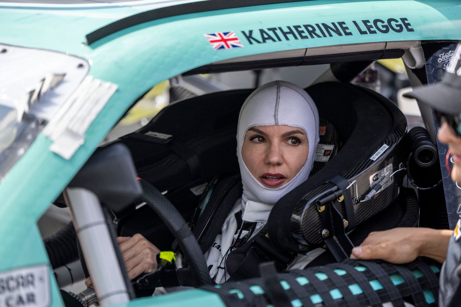 Apr 26, 2025; Talladega, Alabama, USA; Xfinity Series driver Katherine Legge (32) works with her team before the NASCAR Xfinity: Ag-Pro 300 at Talladega Superspeedway. Mandatory Credit: Vasha Hunt-Imagn Images