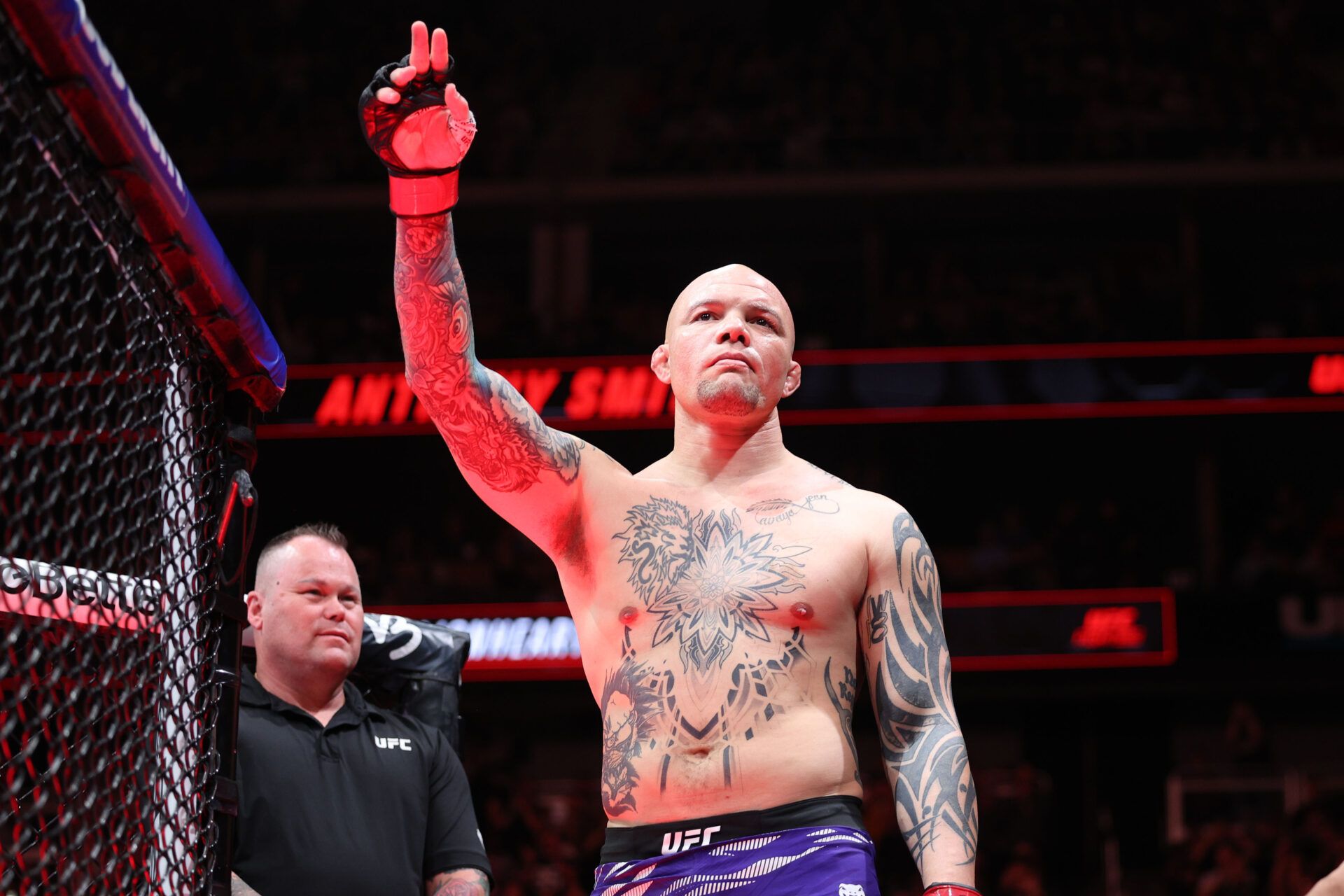 Apr 26, 2025; Kansas City, Missouri, UNITED STATES; Anthony Smith (red gloves) prepares to fight Zhang Mingyang (not pictured) during UFC Fight Night at T-Mobile Center. Mandatory Credit: William Purnell-Imagn Images