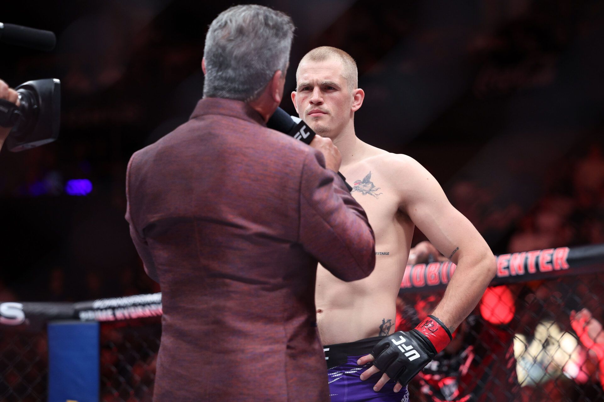 Apr 26, 2025; Kansas City, Missouri, UNITED STATES; Ian Machado Garry (red gloves) prepares to fight Carlos Prates (not pictured) during UFC Fight Night at T-Mobile Center. Mandatory Credit: William Purnell-Imagn Images