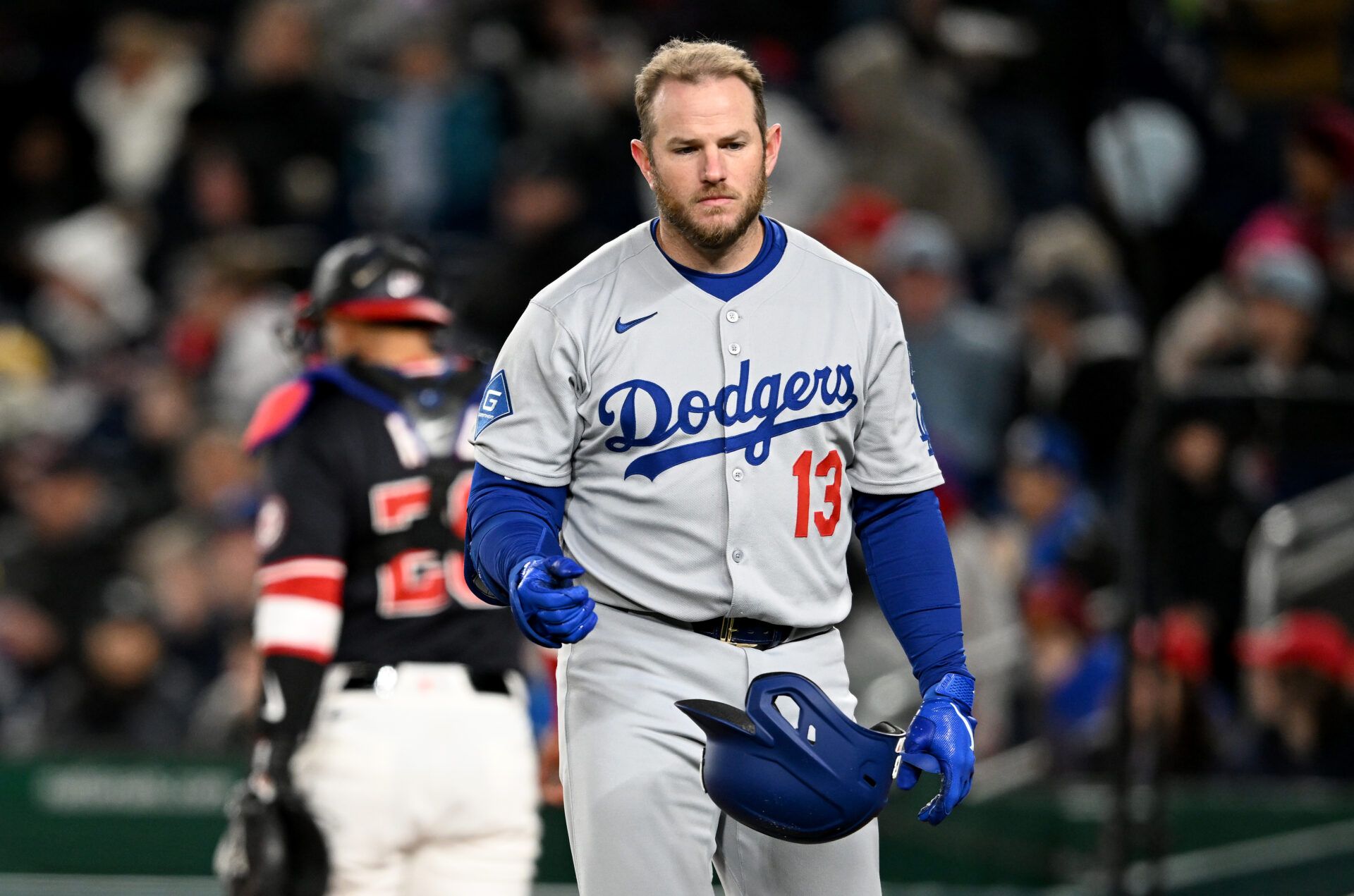 WASHINGTON, DC - APRIL 08: Max Muncy #13 of the Los Angeles Dodgers tosses his helmet after striking out in the sixth inning against the Washington Nationals at Nationals Park on April 08, 2025 in Washington, DC. (Photo by Greg Fiume/Getty Images)