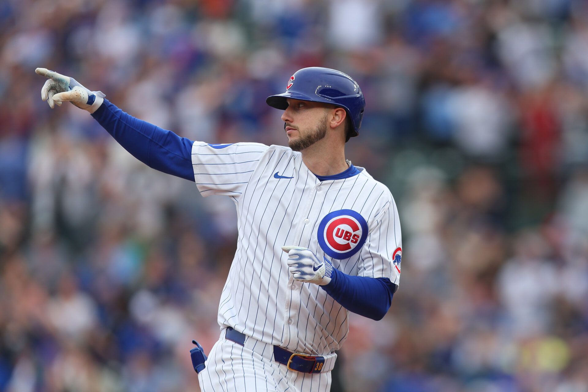 CHICAGO, ILLINOIS - APRIL 18: Kyle Tucker #30 of the Chicago Cubs celebrates hitting a home run during the eighth inning against the Arizona Diamondbacks at Wrigley Field on April 18, 2025 in Chicago, Illinois. (Photo by Geoff Stellfox/Getty Images)