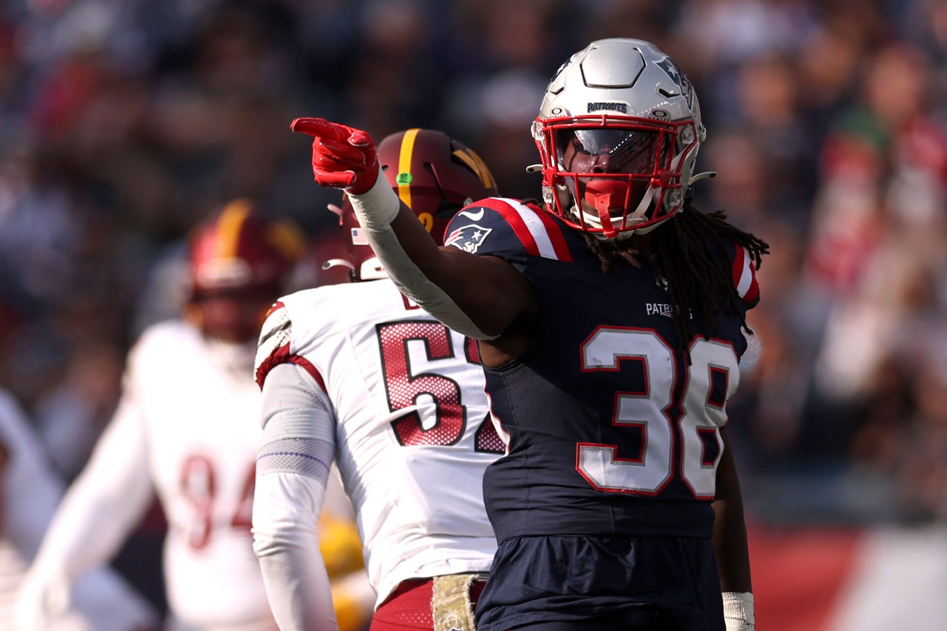 FOXBOROUGH, MASSACHUSETTS - NOVEMBER 05: Rhamondre Stevenson #38 of the New England Patriots reacts after a first down during the first quarter in the game against the Washington Commanders at Gillette Stadium on November 05, 2023 in Foxborough, Massachusetts. (Photo by Maddie Meyer/Getty Images)