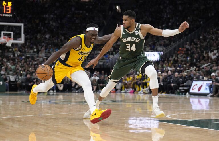 Apr 25, 2025; Milwaukee, Wisconsin, USA; Indiana Pacers forward Pascal Siakam (43) against Milwaukee Bucks forward Giannis Antetokounmpo (34) in the first half during game three of first round for the 2024 NBA Playoffs at Fiserv Forum. Mandatory Credit: Michael McLoone-Imagn Images