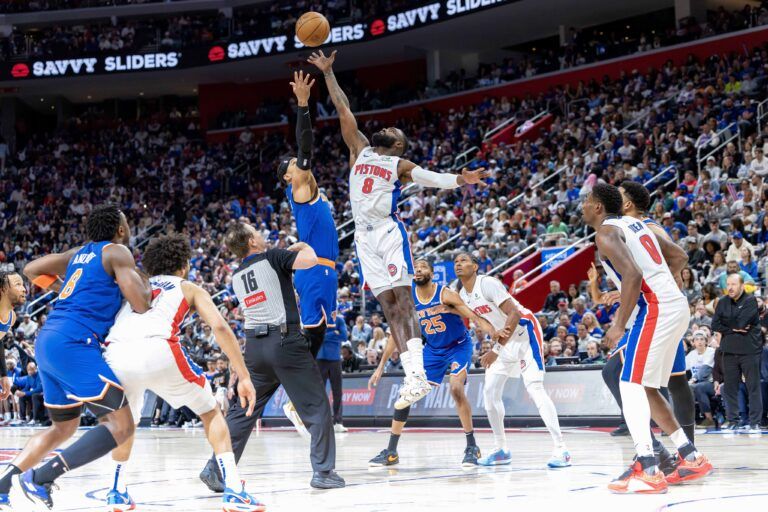 Detroit Pistons forward Tim Hardaway Jr. (8) has a jump ball against New York Knicks guard Josh Hart (3) during the second quarter of game four of first round for the 2025 NBA Playoffs at Little Caesars Arena.