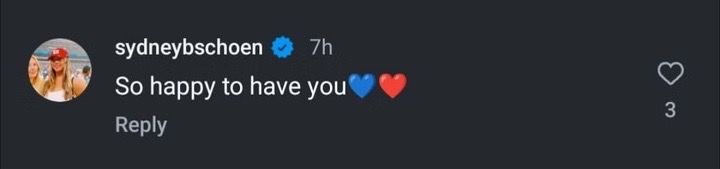 A comment on social media from @sydneybschoen that reads "So happy to have you" with blue and red heart emojis
