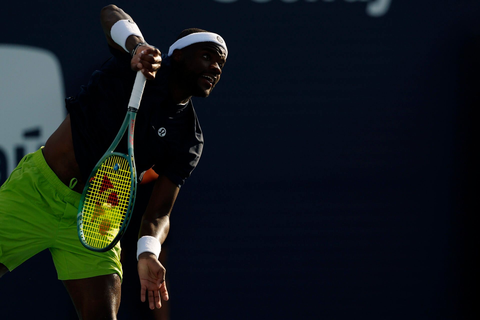 Mar 24, 2025; Miami, FL, USA; Frances Tiafoe (USA) serves against Arthur Fils (FRA)(not pictured) on day seven of the Miami Open at Hard Rock Stadium. Mandatory Credit: Geoff Burke-Imagn Images