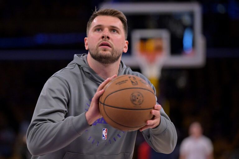 Apr 19, 2025; Los Angeles, California, USA; Los Angeles Lakers guard Luka Doncic (77) warms up prior to the game against the Minnesota Timberwolves at Crypto.com Arena. Mandatory Credit: Jayne Kamin-Oncea-Imagn Images
