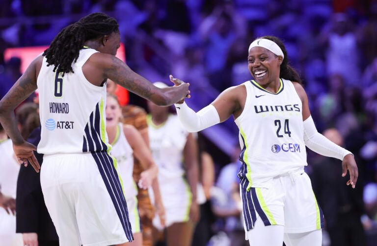 May 15, 2024; Arlington, Texas, USA; Dallas Wings guard Arike Ogunbowale (24) celebrates with Dallas Wings forward Natasha Howard (6) during the second half against the Chicago Sky at College Park Center. Mandatory Credit: Kevin Jairaj-USA TODAY Sports