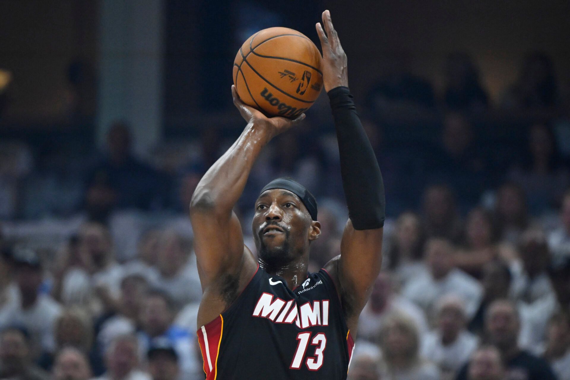 Apr 23, 2025; Cleveland, Ohio, USA; Miami Heat center Bam Adebayo (13) shoots in the first quarter of game two of the first round of the 2025 NBA Playoffs against the Cleveland Cavaliers at Rocket Arena. Mandatory Credit: David Richard-Imagn Images