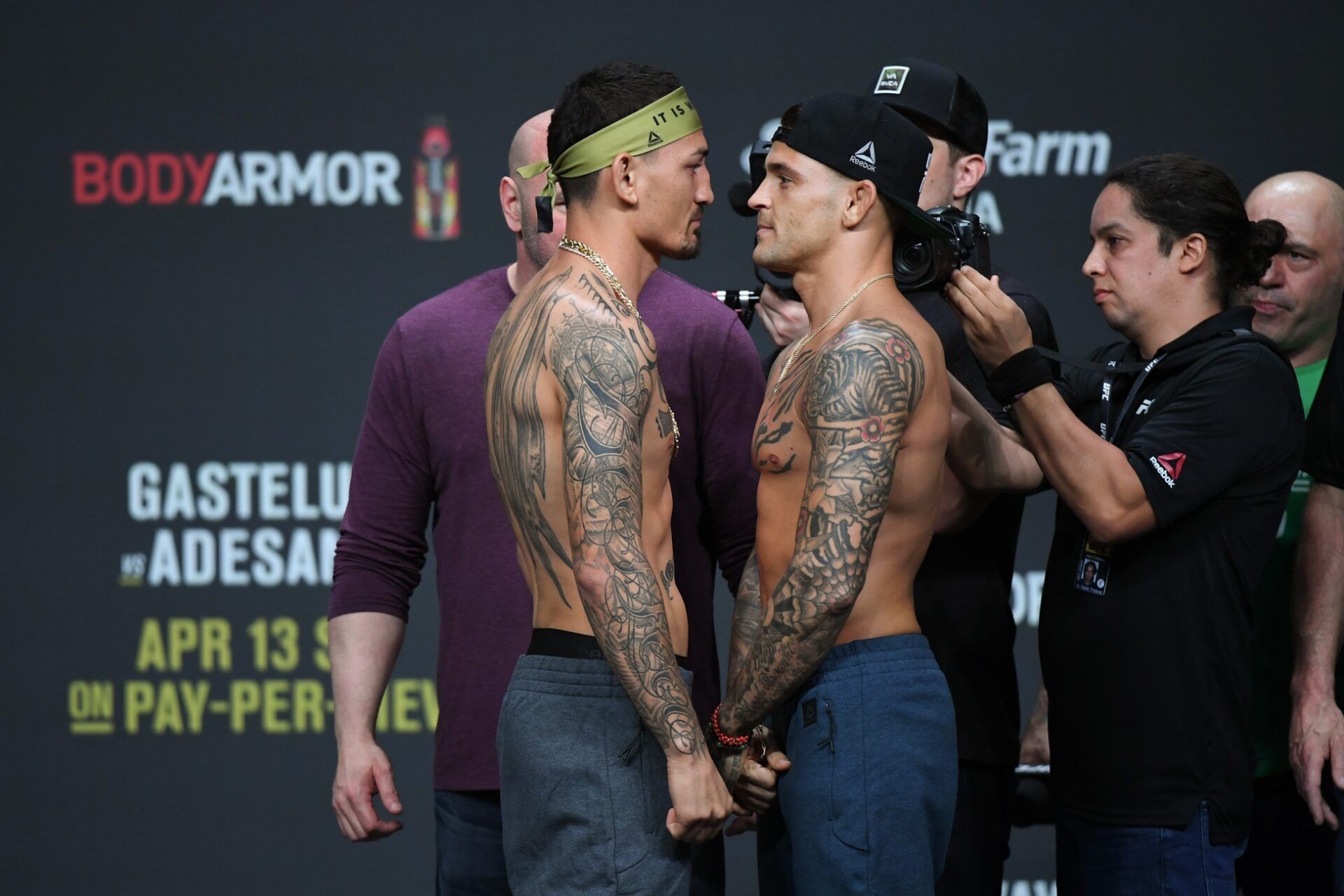Max Holloway (left) and Dustin Poirier (right) during weigh ins for UFC 236 at State Farm Arena.