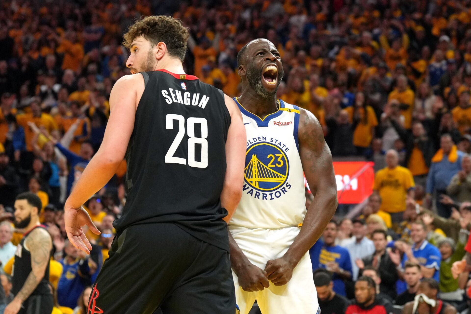 Apr 26, 2025; San Francisco, California, USA; Golden State Warriors forward Draymond Green (23) reacts after forcing a turnover by Houston Rockets center Alperen Sengun (28) during the fourth quarter of game three of first round for the 2024 NBA Playoffs at Chase Center. Mandatory Credit: Darren Yamashita-Imagn Images