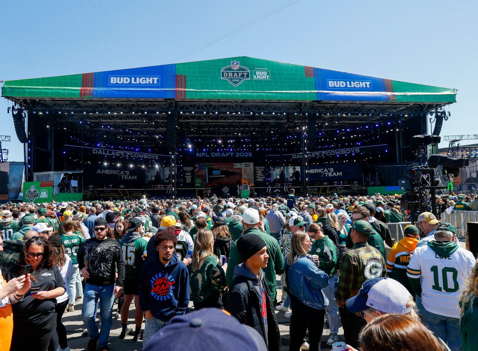 Fans gather in front of the Draft Theater to watch the third and final day of the 2025 NFL Draft on Saturday, April 26, 2025, at Lambeau Field in Green Bay, Wisconsin.