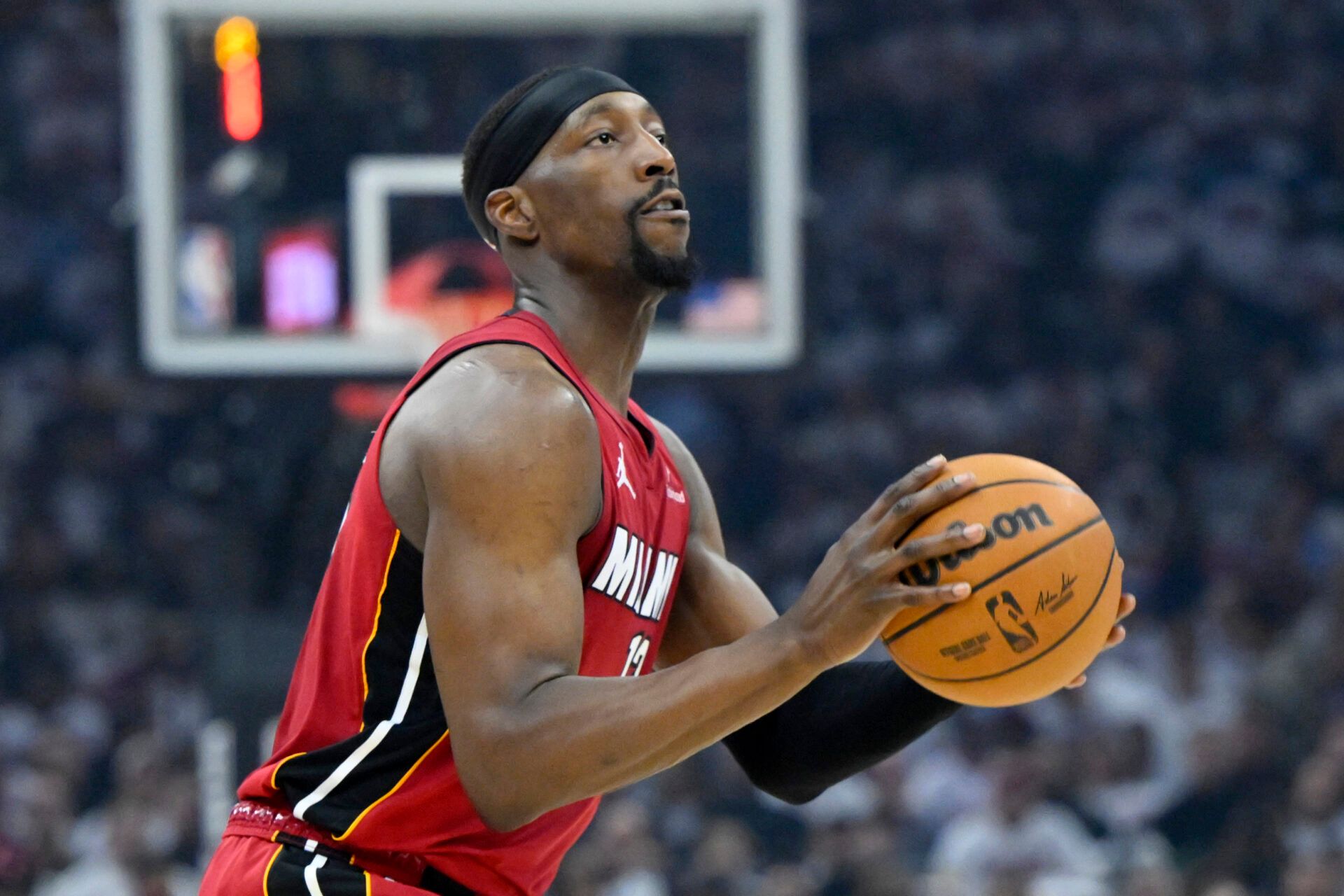 Apr 20, 2025; Cleveland, Ohio, USA; Miami Heat center Bam Adebayo (13) looks to shoot in the first quarter against the Cleveland Cavaliers at Rocket Arena. Mandatory Credit: David Richard-Imagn Images